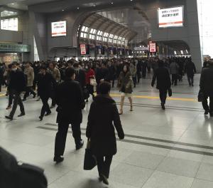 Shinagawa train station in the late morning. Trying to cross the traffic requires strategy and deliberate action.