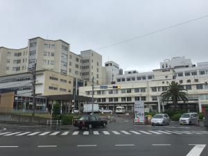 Outside the hospital on a rainy day.