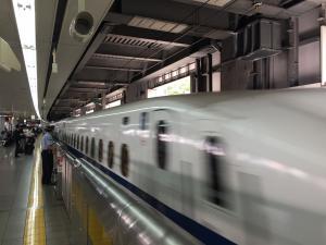 Shinkansen bullet train arrives at Nagoya station.