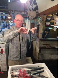 Andy showing us some of the fresh fish of the day - much of what we got to eat that night at the restaurant!