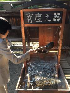 My colleague Nami-san demonstrating how the students at Japan's first school, located in Ashikaga, would learn discipline and humility by mastering how to pour the water precisely - just enough but not too much to dump it out. 