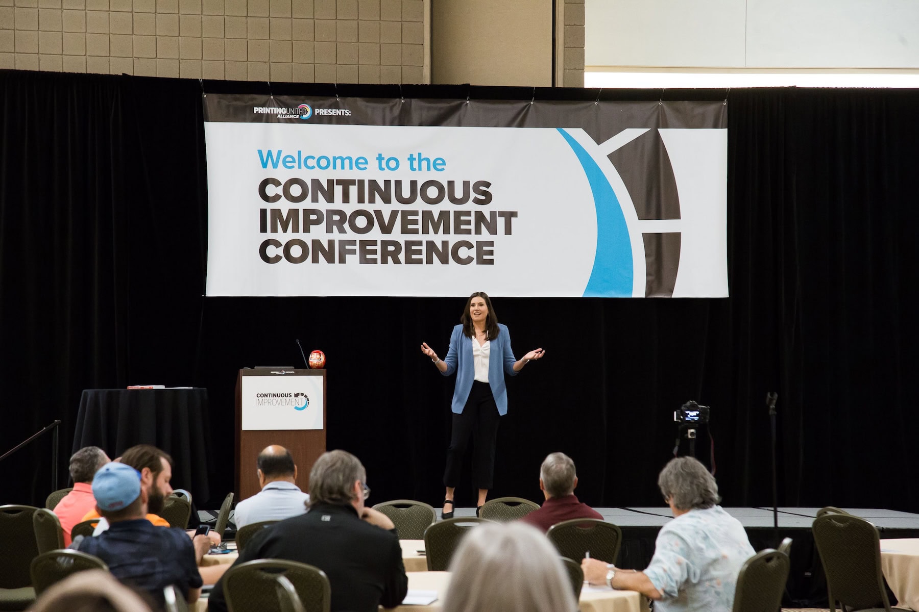 Katie Anderson Speaking on Stage