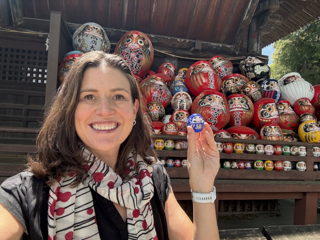 Traditional Japanese Daruma dolls symbolizing resilience, perseverance, and leadership growth.
